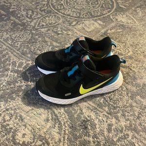 Nike size 1y black, yellow and blue. Worn once